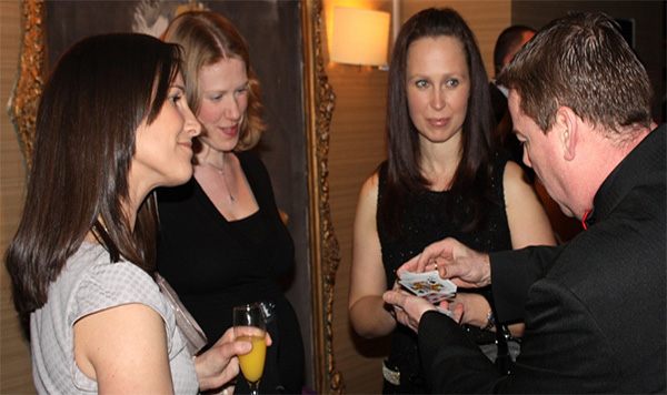 Three Ladies, a Magician and a Card Tick